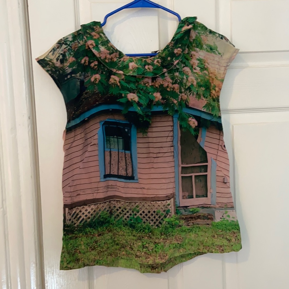 Photograph shirt with button details on back